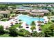 Resort-style pool with lounge chairs and surrounding landscaping at 12261 Canavese Ln, Venice, FL 34293