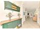 Inviting entryway with built-in storage and decorative accents at 12261 Canavese Ln, Venice, FL 34293