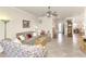 Open living room with views into the kitchen and dining areas at 12261 Canavese Ln, Venice, FL 34293