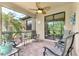 Spacious screened-in porch, perfect for relaxing and enjoying the view at 12261 Canavese Ln, Venice, FL 34293