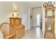 Bright and spacious entryway with antique furniture and hardwood floors at 12261 Canavese Ln, Venice, FL 34293
