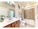 Bathroom with single vanity, tub, and shower at 12261 Canavese Ln, Venice, FL 34293