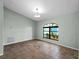 Bright dining room with large window and tile floor at 351 Woodvale Dr, Venice, FL 34293