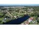 Aerial view showcasing community and canal at 12004 Sarto Ln, North Port, FL 34287