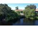 Backyard oasis with private dock access to peaceful canal at 12004 Sarto Ln, North Port, FL 34287