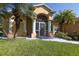 Well-maintained home with a screened porch and landscaping at 12004 Sarto Ln, North Port, FL 34287