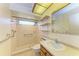 Clean bathroom with shower, toilet and sink at 4283 Eastwood Dr, Sarasota, FL 34232