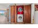 Convenient laundry closet with stacked washer and dryer at 1401 S Mccall Rd # 107B, Englewood, FL 34223