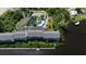 Community features pool, tennis courts, and water views at 1401 S Mccall Rd # 107B, Englewood, FL 34223