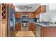 Modern kitchen with stainless steel appliances and granite countertops at 1401 S Mccall Rd # 107B, Englewood, FL 34223