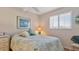 Bedroom with ensuite bathroom and water view at 1401 S Mccall Rd # 107B, Englewood, FL 34223