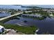 Aerial view of the community and surrounding waterways at 1401 S Mccall Rd # 107B, Englewood, FL 34223