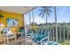 Relaxing screened porch with comfy seating and water views at 1401 S Mccall Rd # 107B, Englewood, FL 34223