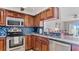 Updated kitchen with granite counters and stainless steel appliances at 1401 S Mccall Rd # 107B, Englewood, FL 34223
