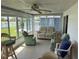 Relaxing sunroom overlooking a tranquil lake at 200 Roma Rd, Venice, FL 34285
