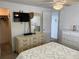 Bedroom with large dresser and walk-in closet at 200 Roma Rd, Venice, FL 34285
