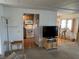 Small kitchen with white appliances and wooden cabinets at 200 Roma Rd, Venice, FL 34285