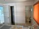Small bathroom with toilet and sliding door at 200 Roma Rd, Venice, FL 34285