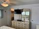 Bedroom with dresser, mirror and closet at 200 Roma Rd, Venice, FL 34285