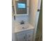 Clean bathroom with vanity sink and medicine cabinet at 200 Roma Rd, Venice, FL 34285