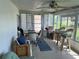 Spacious sunroom with view and seating area at 200 Roma Rd, Venice, FL 34285