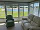 Relaxing sunroom overlooking a pond at 200 Roma Rd, Venice, FL 34285