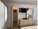 Bedroom with walk-in closet and large dresser at 200 Roma Rd, Venice, FL 34285