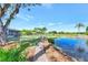 Brick walkway next to a pond and golf course at 5103 Greencroft Rd, Sarasota, FL 34235