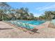 Community pool with plenty of lounge chairs at 5103 Greencroft Rd, Sarasota, FL 34235
