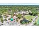 Aerial view of community with clubhouse and golf course at 5103 Greencroft Rd, Sarasota, FL 34235