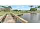 Wooden bridge over a pond next to a golf course at 5103 Greencroft Rd, Sarasota, FL 34235