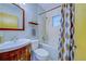 Clean bathroom with tub, shower, and updated vanity at 879 E Seminole Dr, Venice, FL 34293