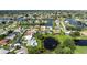 Single story home with pool, overlooking a serene pond at 1009 Tam O Shanter Ct, Venice, FL 34293