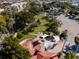 Arial view of a park with fountain, shade structures and ample parking at 1211 Capri Isles Blvd # 96, Venice, FL 34292