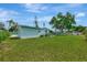 Well-maintained lawn and mature trees surround this updated home at 1757 Mova St, Sarasota, FL 34231
