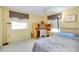 Bedroom with a twin bed, desk, and window seating at 475 Circlewood Dr # O18, Venice, FL 34293