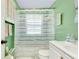 Clean bathroom with shower/tub and white vanity at 475 Circlewood Dr # O18, Venice, FL 34293