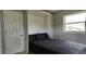 Small bedroom with murphy bed and closet at 5295 Drew Rd, Venice, FL 34293