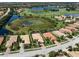Luxury home in a golf course community with a lake view at 117 Savona Way, North Venice, FL 34275