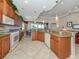 Large kitchen with granite island and breakfast bar at 117 Savona Way, North Venice, FL 34275