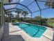 Relaxing screened-in pool and spa at 117 Savona Way, North Venice, FL 34275