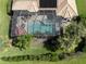 Aerial view of the home's pool and backyard at 145 Montelluna Dr, North Venice, FL 34275