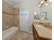 Guest bathroom with shower/tub combo and updated vanity at 145 Montelluna Dr, North Venice, FL 34275