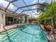 Inviting screened pool and spa, perfect for relaxation at 145 Montelluna Dr, North Venice, FL 34275