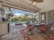 Enjoy this relaxing pool and spa area, complete with outdoor dining and a screened enclosure at 145 Montelluna Dr, North Venice, FL 34275