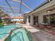 Spacious pool area with spa and screened patio at 145 Montelluna Dr, North Venice, FL 34275