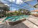 Expansive pool and spa with screened enclosure at 145 Montelluna Dr, North Venice, FL 34275