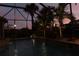 Night view of the relaxing pool area at 145 Montelluna Dr, North Venice, FL 34275