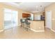 This home offers a kitchen with breakfast bar and stainless steel appliances at 277 Mestre Pl, North Venice, FL 34275