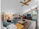 Spacious bonus room with vaulted ceiling, fireplace and plenty of seating at 760 Village Cir # 212, Venice, FL 34292